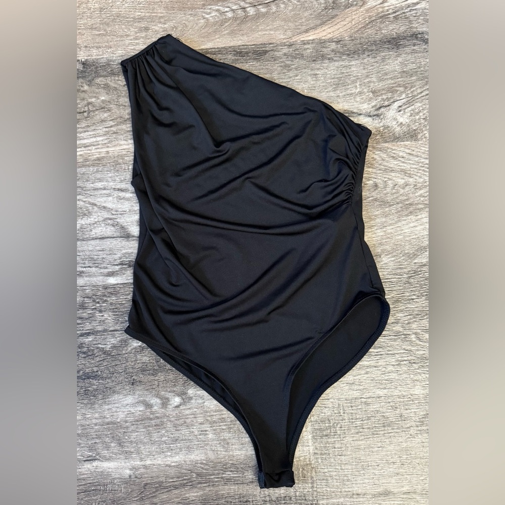 Woman’s Black One-Shoulder Bodysuit